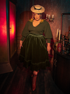 Witness the allure of the hauntingly gorgeous Victorian Velvet Bustle Skirt in Olive as models bring it to life for La Femme en Noir, the gothic clothing brand.