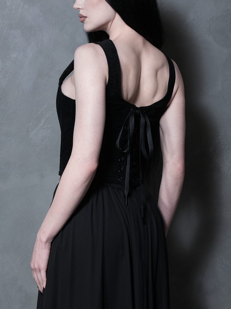 Close-up of the sturdy, elegant silver busk closures on the front of the Countess Black Velvet Corset, blending historical charm with modern gothic glamour.