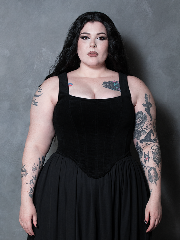 Close-up of the delicate upper trim and plunging neckline of the velvet corset, ideal for styling a romantic goth ensemble.