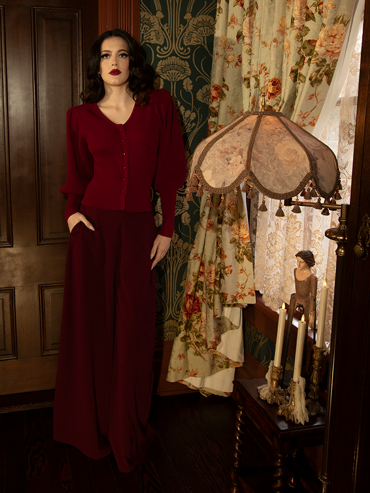 A decadent dance of fabric and hue, these pants summon a storm of elegance, inspired by antique velvet and blood-kissed roses.