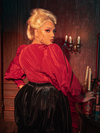Gothic charm emanates as female models strike poses in the Taffeta Edwardian Blouse in Crimson Red, showcasing its unique design.