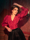 Gothically glamorous female models exude sophistication while modeling the Taffeta Edwardian Blouse in Crimson Red, displaying its versatility through poses.