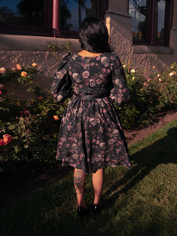 A vision of decayed grandeur, the Dark Forest Dress captures twilight elegance with its darkly romantic print and timeless silhouette.