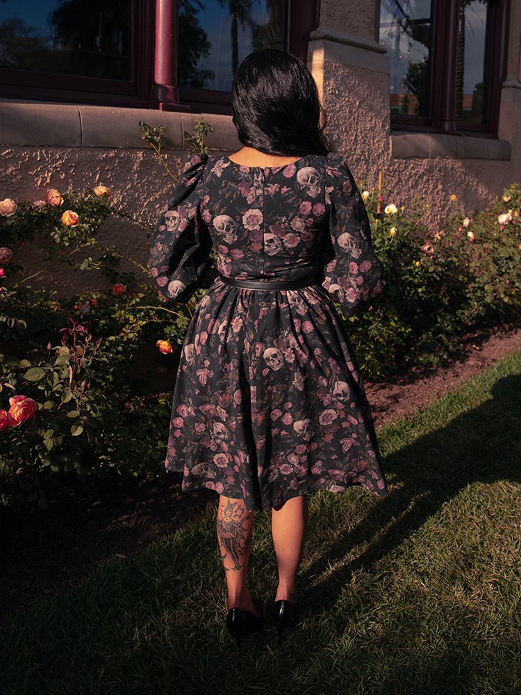 A vision of decayed grandeur, the Dark Forest Dress captures twilight elegance with its darkly romantic print and timeless silhouette.