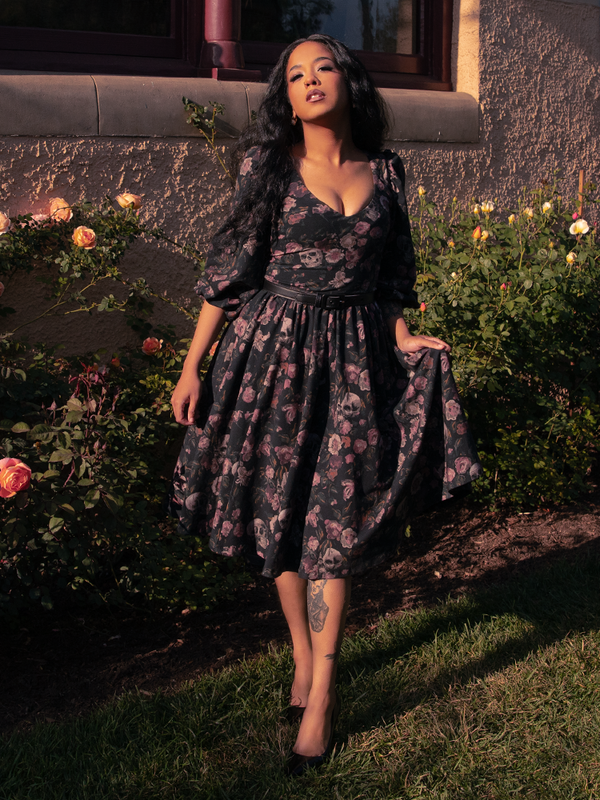 The Dark Forest Dress in Decayed Beauty Print evokes gothic enchantment, with sweeping lines and a print that whispers of withered beauty.