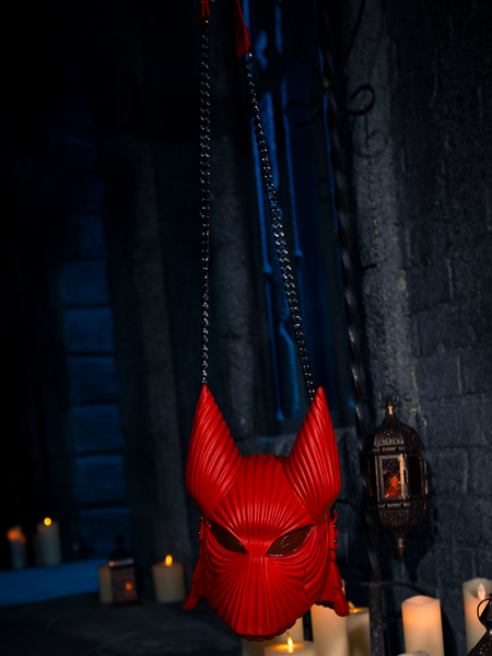 The eerie charm of the candle-lit dungeon perfectly complemented the Blood-Red BRAM STOKER'S DRACULA Order of the Dragon Helmet Bag.