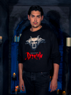 In the dimly lit depths of a dungeon, the earthly model showcases the Gargoyle Sculpture Sweatshirt in Black, an exquisite piece from La Femme en Noir's BRAM STOKER'S DRACULA collection.