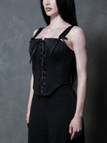 A female model wears a luxurious black sateen corset, epitomizing the enchanting allure of modern Whimsigoth style.