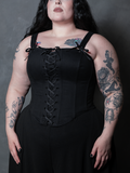 A female model brings an air of aristocratic dark elegance to life, adorned in a dramatic black cotton corset.