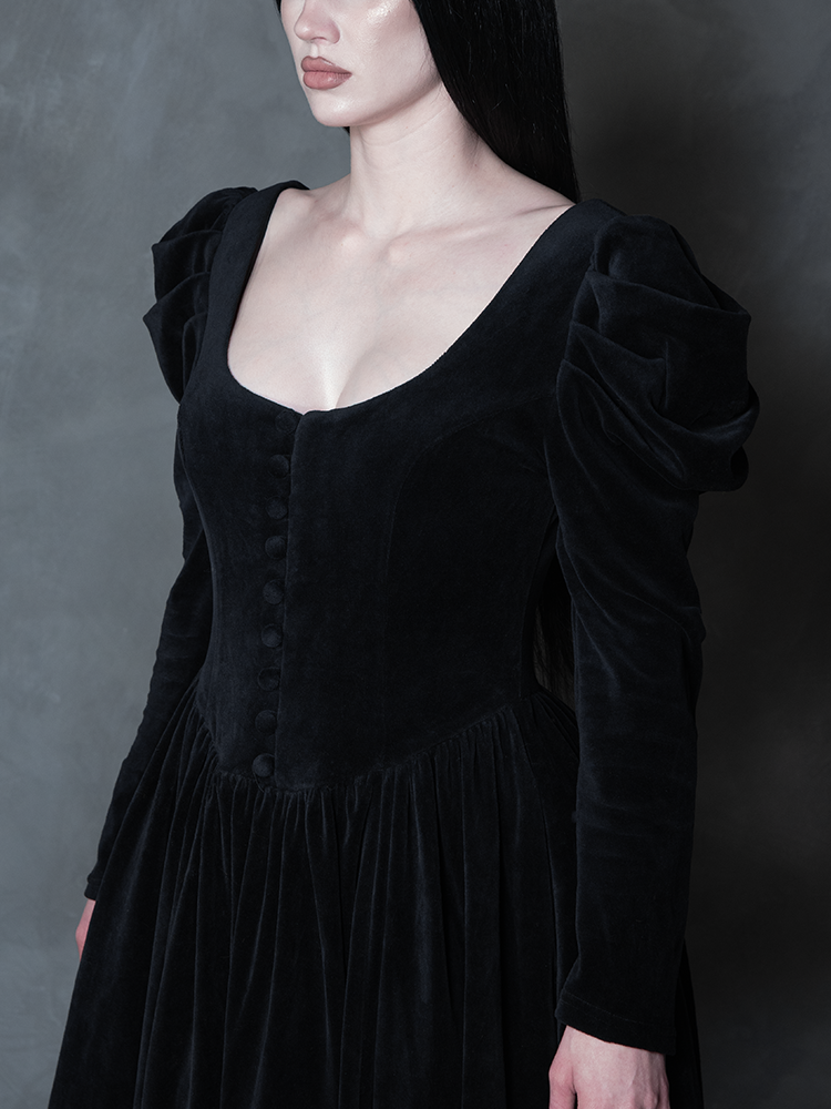 Female model wearing the Haunted Beauty Victorian Mourning Dress & Capelet Set in Black, portraying romantic gothic dresses and spellbinding enchantment.