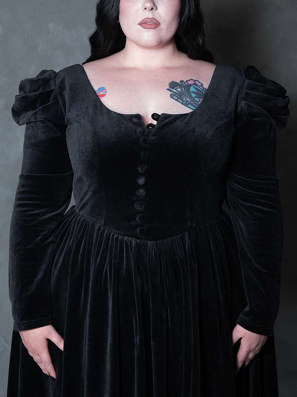 Model styled in the Haunted Beauty Victorian Mourning Dress & Capelet Set in Black, embodying gothic romanticism and dramatic sophistication.