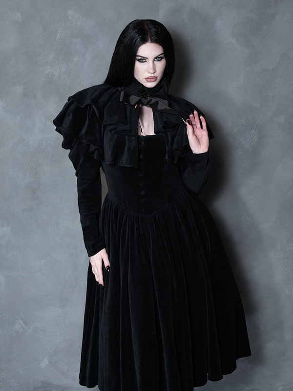 Female model wearing the Haunted Beauty Victorian Mourning Dress & Capelet Set in Black, embodying romantic goth fashion and dark elegance.