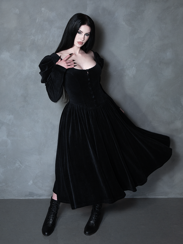 Model styled in the Haunted Beauty Victorian Mourning Dress & Capelet Set in Black, exuding gothic royalty and enchanted midnight style.