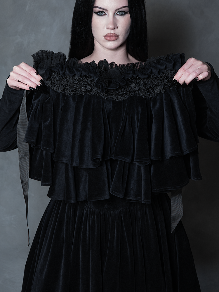Female model wearing the Haunted Beauty Victorian Mourning Dress & Capelet Set in Black, channeling victorian dark dress sensibilities and seductive mystery.