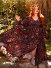 Envelop yourself in the Heroine Maxi Dress in Pomegranate Print, where gothic elegance meets timeless romance. Perfect for twilight soirées and moonlit whispers, it exudes dark, alluring beauty.