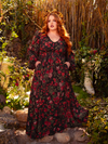 Step into the shadows with the Heroine Maxi Dress in Pomegranate Print. This gothic masterpiece, with its deep red hues and elegant design, is ideal for moonlit dances and secret encounters.