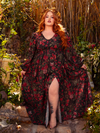 Embrace dark romance with the Heroine Maxi Dress in Pomegranate Print, a flowing masterpiece that whispers tales of forbidden love. This ethereal gown features a rich crimson pattern, perfect for moonlit dances and shadowy gardens.