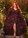 The Heroine Maxi Dress in Pomegranate Print is a hauntingly beautiful creation, perfect for gothic queens. Its rich crimson pattern and flowing silhouette evoke a world of dark enchantment.