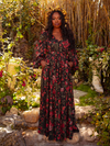 The Heroine Maxi Dress in Pomegranate Print is a dark, romantic vision. Its rich crimson pattern and flowing silhouette evoke the beauty of gothic poetry and the allure of forgotten realms.