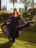 The Juliet Sheer Lace Maxi Dress in Black captures dark romance with its flowing lace, a gown of haunting beauty made for midnight enchantments.