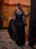 The Juliet Sheer Lace Maxi Dress in Black is a timeless piece of gothic glamour, its lace detail and flowing form echoing eternal romance.