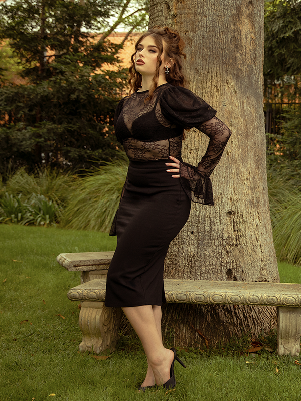 The Juliet Lace Top in Black calls to lovers of gothic glamour, its lace details framing the silhouette with haunting grace.