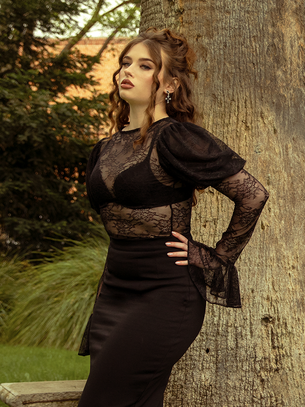 The Juliet Lace Top in Black blends romance and shadow, its lace design exuding a hauntingly graceful presence.