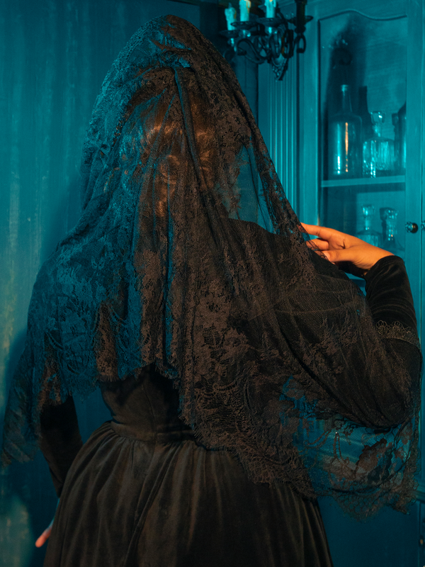 Veil of Nightfall Lace Mourning Scarf in Black: Embrace the enchanting darkness of the Veil of Nightfall Lace Mourning Scarf, a poetic garment that wraps its wearer in layers of luxurious black lace. 