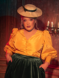 Witness the allure of the hauntingly gorgeous Taffeta Edwardian Blouse in Marigold as models bring it to life for La Femme en Noir, the gothic clothing brand.
