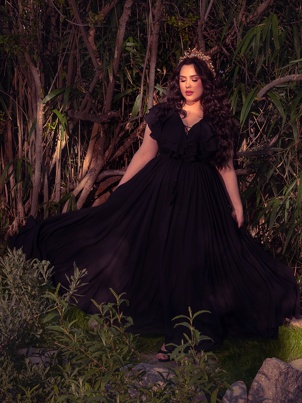 A breathtaking vision of the Mythical Goddess Gown in Black, featuring a sweeping floor-length skirt and ethereal draping that embodies dark elegance and high-fashion Victorian Goth opulence.