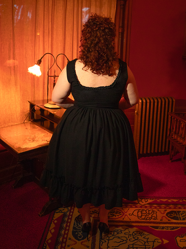 A masterpiece of gothic glamour, the Nightshade Underpinning Dress in Antique Black transforms twilight into timeless elegance.