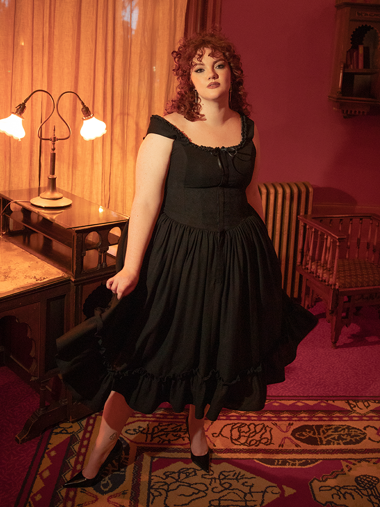 Echoes of Victorian beauty meet modern seduction—the Nightshade Dress is crafted for the siren cloaked in sophistication.