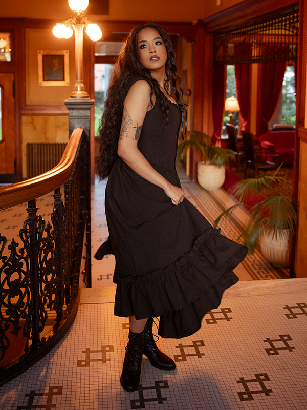 Corseted grace meets whispered rebellion—the Nightshade Underpinning Dress enchants with its sculpted fit and mourning lace.