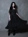 Exuding a regal yet dark confidence, a female model perfectly represents the allure of gothic style dresses in the Nightshade Underpinning Dress in Antique Black.