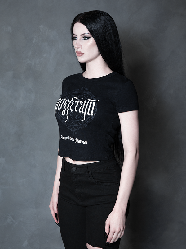 A female model channels high-fashion vampire romance, her darkly enchanting ensemble centered around a premium piece of gothic apparel bearing a sinister sigil.