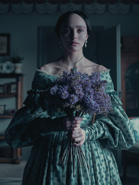 The Ellen Victorian Dress enchants with a blue floral design and delicate detailing, perfect for moonlit gatherings or vintage-inspired soirées.

