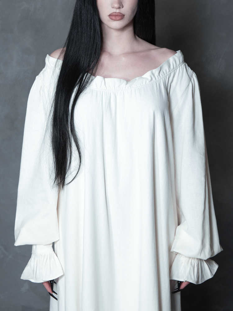 A captivating look that breathes new life into Victorian Goth aesthetics, featuring a model in a beautifully crafted gothic fashion dress destined for twilight hours.