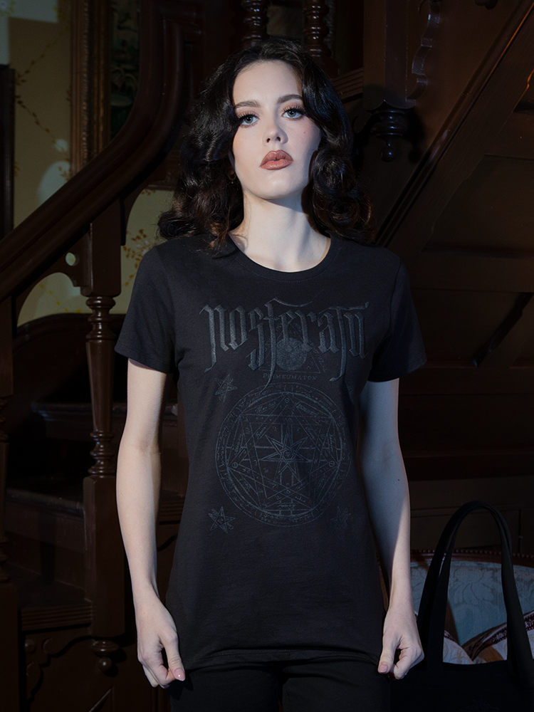Channel gothic decadence with the NOSFERATU Occult Fitted T-shirt. The sigil evokes occult mystique, while the sleek black design flatters every figure.