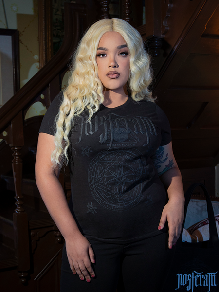 Adorned with an occult-inspired Nosferatu sigil, this black fitted T-shirt embraces gothic mystery and sleek style, ideal for moonlit gatherings.