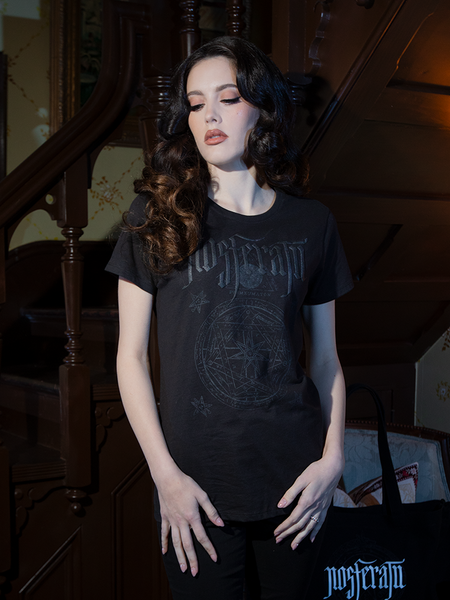 The NOSFERATU Occult Fitted T-shirt pairs an enigmatic sigil with a modern gothic silhouette, offering comfort and allure for dark souls.