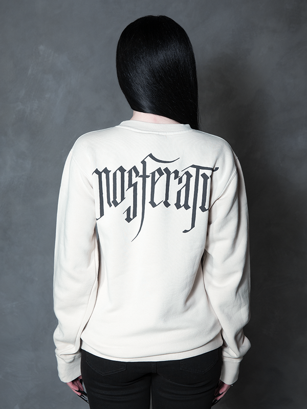 A gothic glamour muse radiates sophisticated darkness, her romantic alternative outfit perfectly complemented by an intricate, contract-inspired relaxed top.