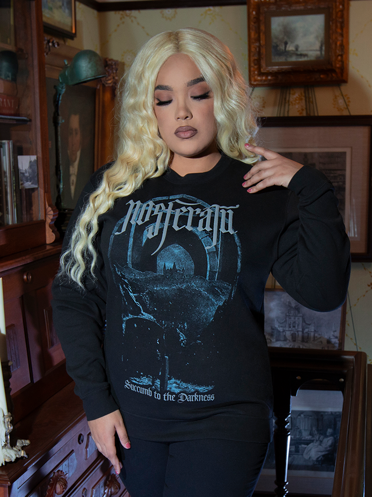 The Nosferatu Castle Sweatshirt embodies dark romance, with its cozy fit, deep black fabric, and a castle graphic straight from classic horror lore.