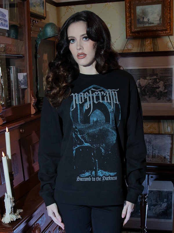 Celebrate the legacy of gothic horror with the Nosferatu Castle Sweatshirt. Its haunting design and plush material make it perfect for chilly twilight strolls.