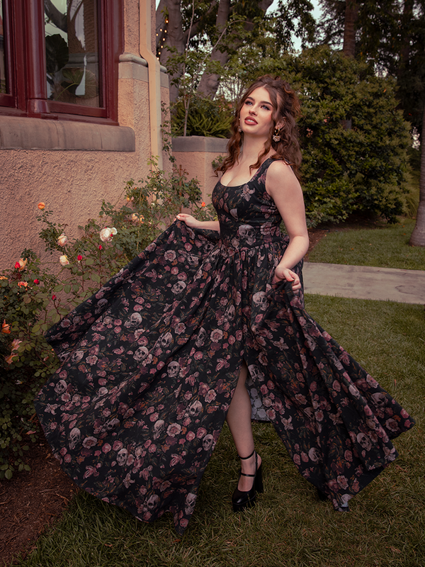 Cloaked in whispers of faded blooms, the Novella Maxi Dress in Decayed Beauty Print transforms evenings into moments of eternal allure.