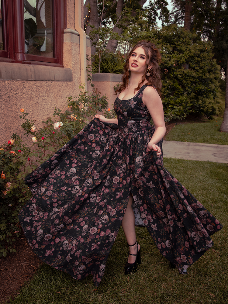 Cloaked in whispers of faded blooms, the Novella Maxi Dress in Decayed Beauty Print transforms evenings into moments of eternal allure.