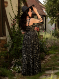 A poetic ode to dark pastoral beauty, the Novella Maxi Dress in Cottage Witch Toile Print merges romance with an air of witching-hour magic.