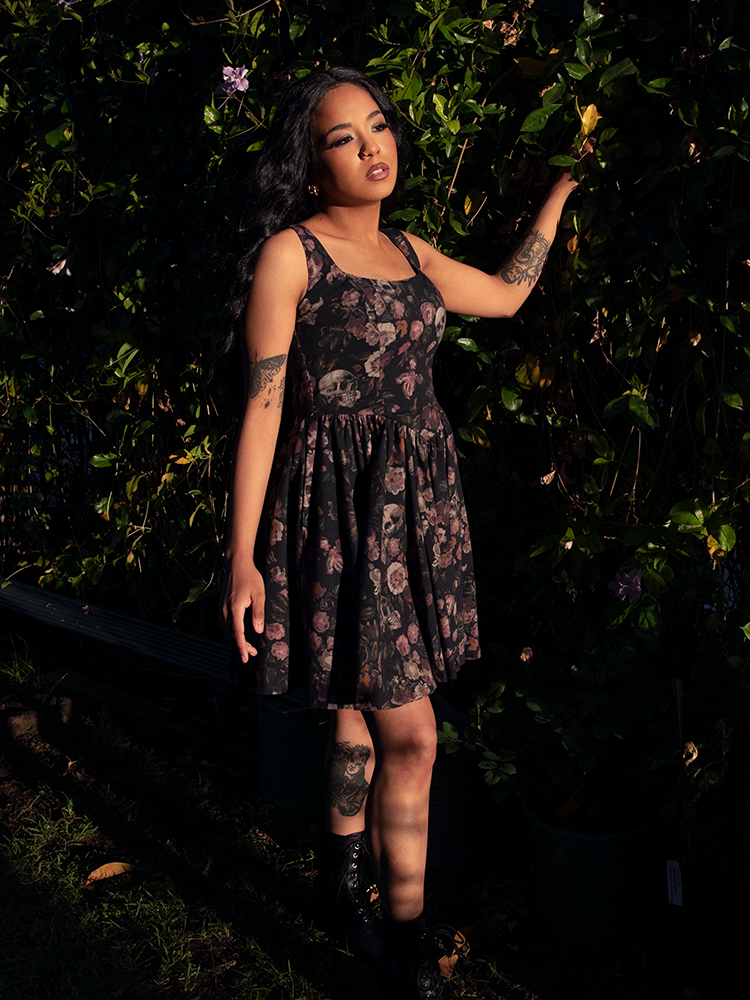 Crafted for twilight adventures, the Novella Mini Dress in Decayed Beauty Print flatters with a playful cut while echoing dark sophistication.