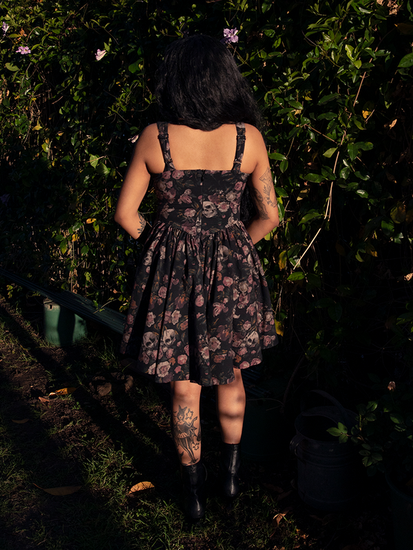 Romantic yet haunting, the Novella Mini Dress in Decayed Beauty Print offers an effortless blend of playful cut and gothic sensibility.