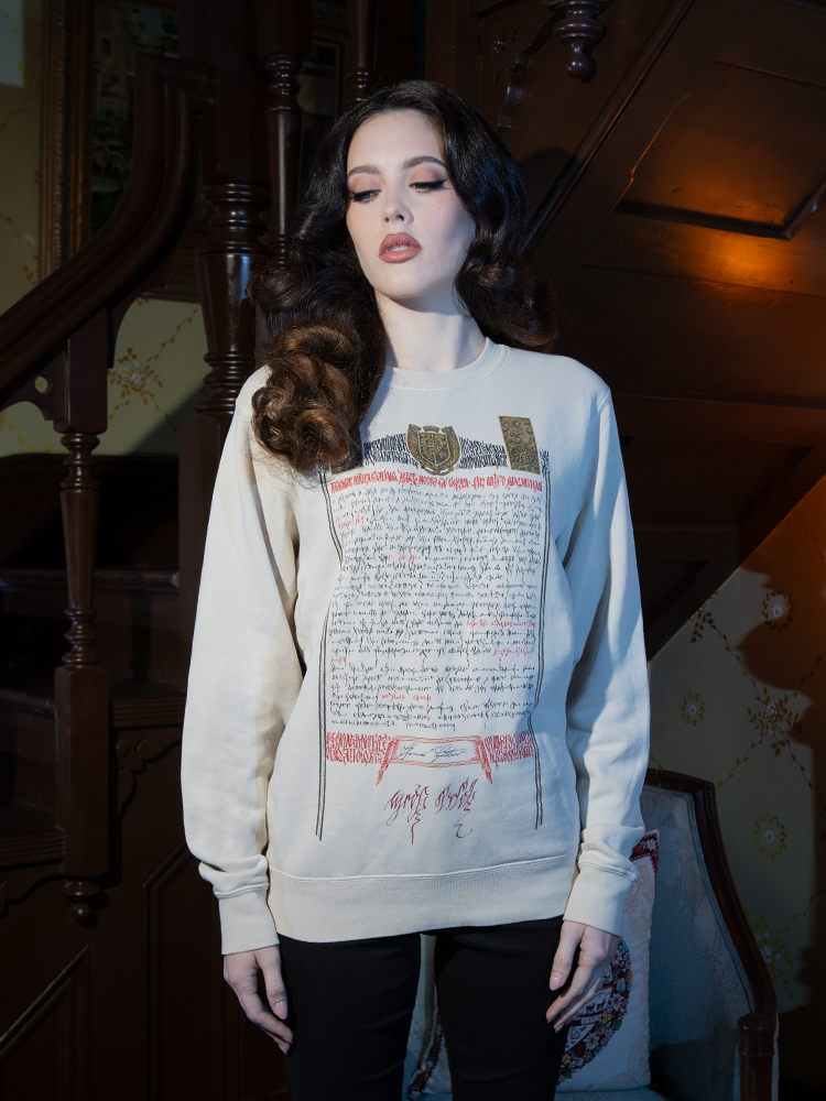 Showcasing the infamous Nosferatu contract in intricate detail, this bone-hued sweatshirt is a hauntingly elegant nod to gothic cinema’s origins.

