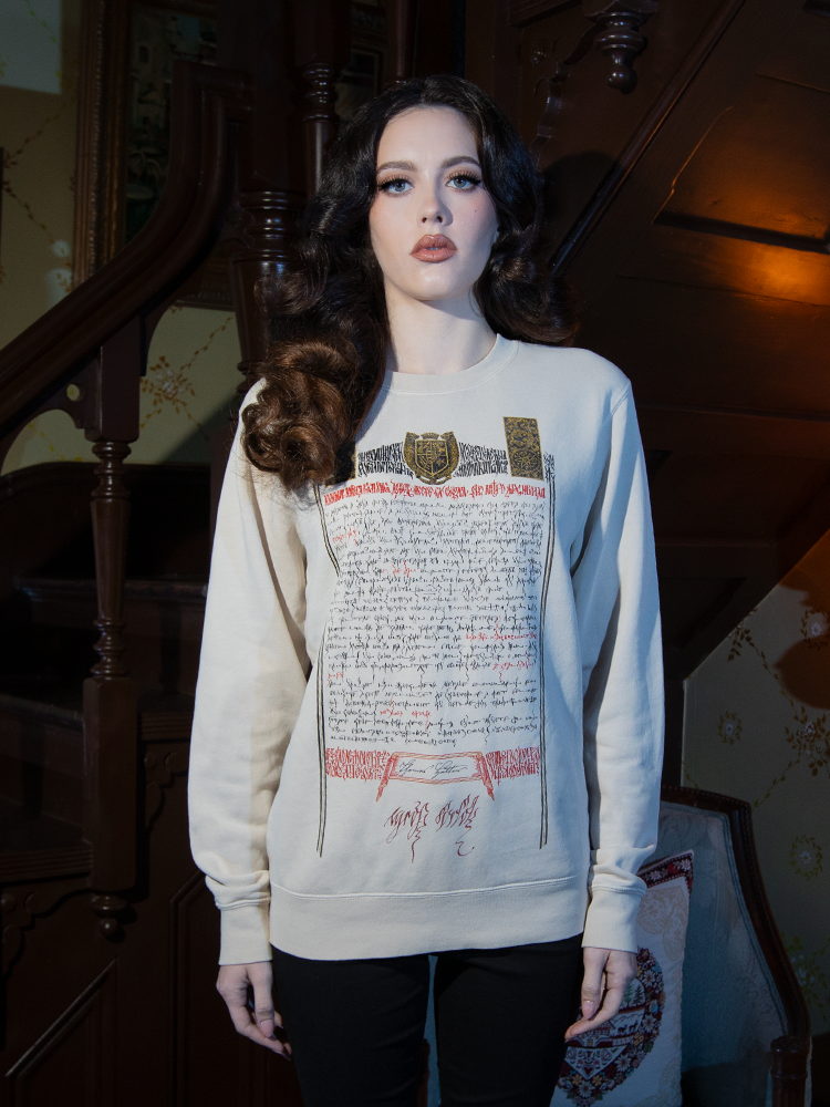Comfort meets mystery in the Count Orlock Contract Sweatshirt. Its pale shade and ominous print make it an ethereal staple for shadowy outings.